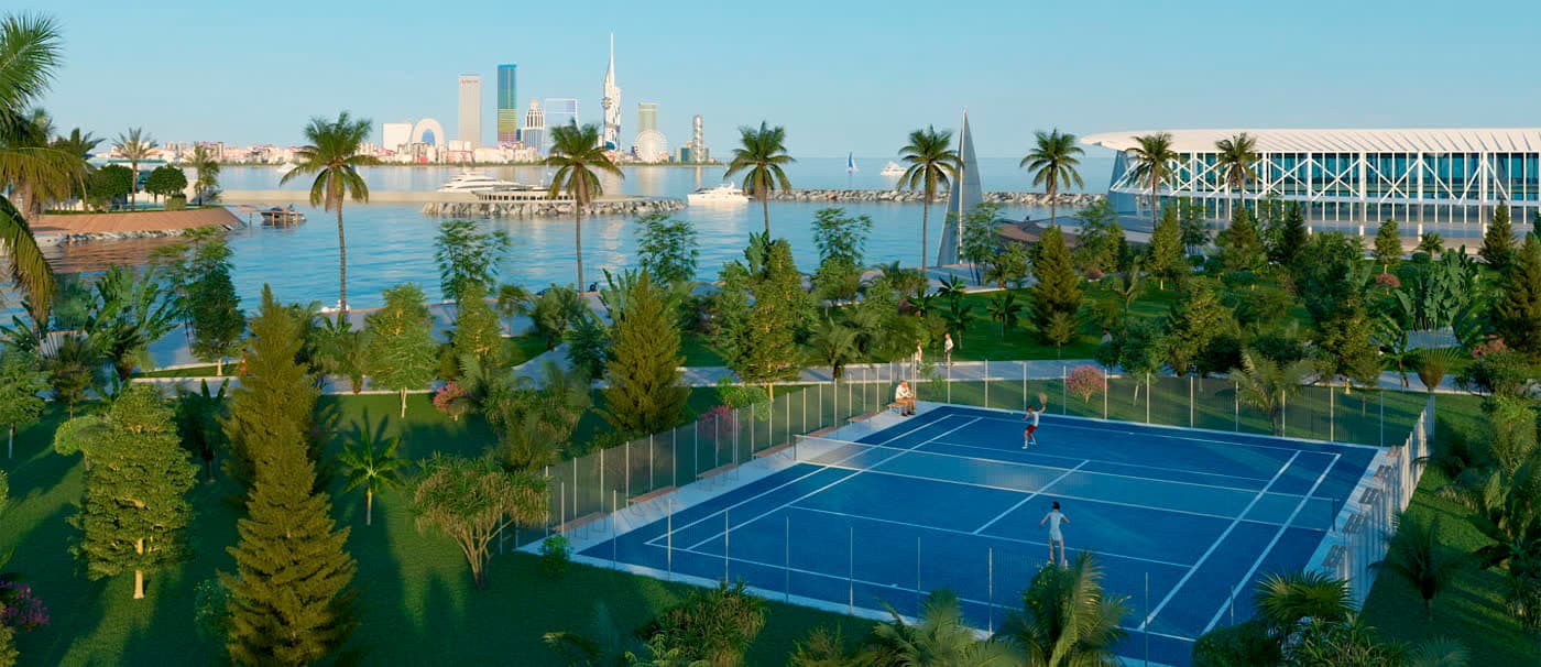 Courts de tennis d’Ambassadori Island entre les jardins et le plan d’eau