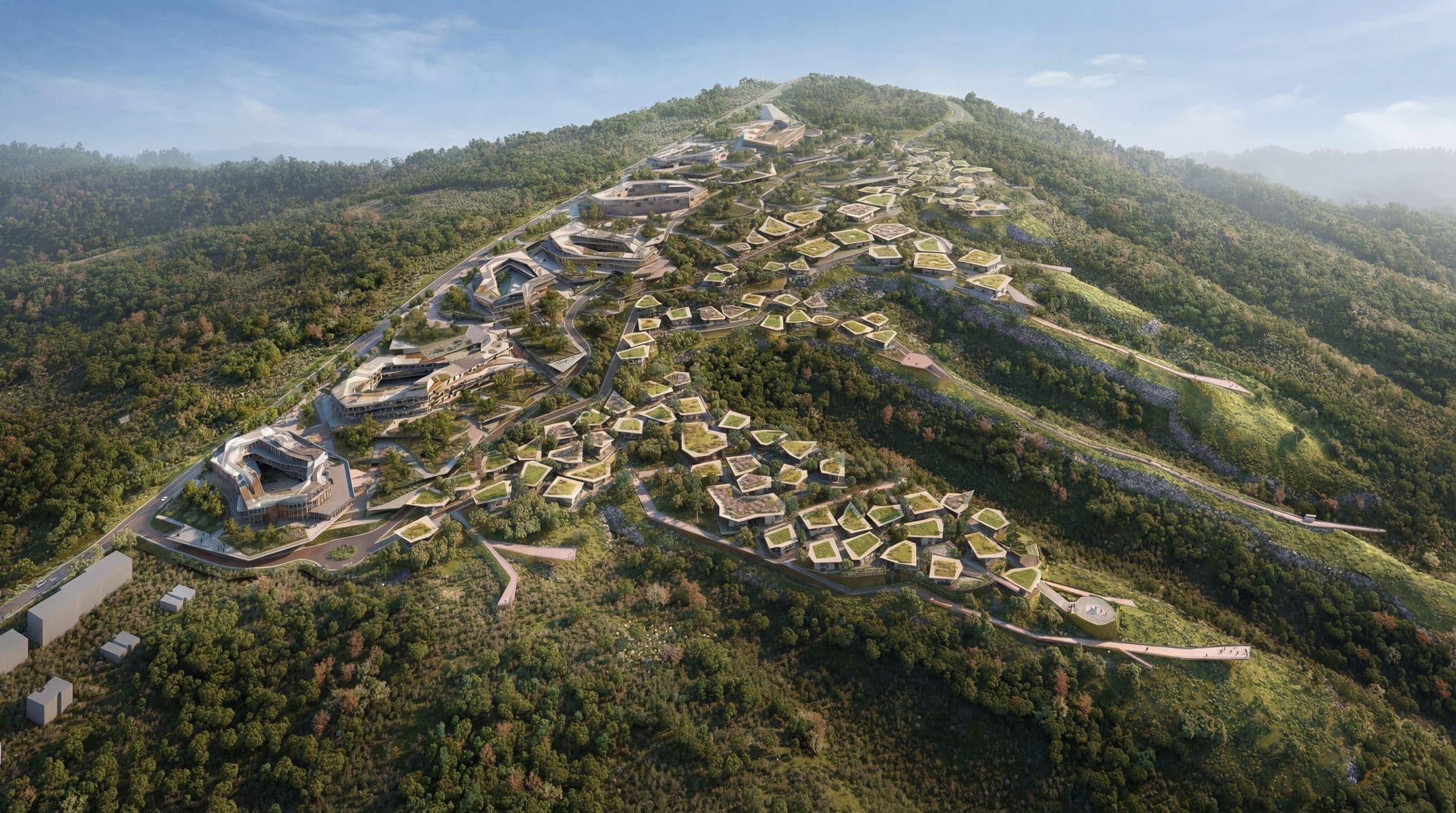 Vue aérienne du masterplan de Mira Verde déployé le long d’une crête boisée au-dessus de Tbilissi